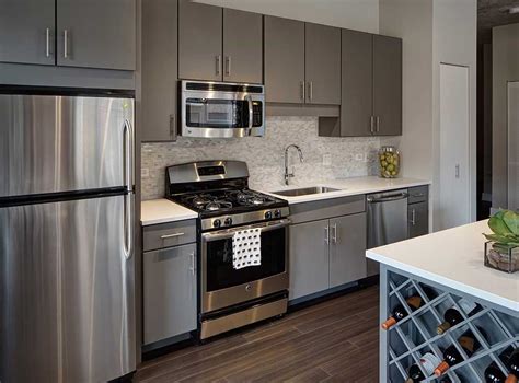 stainless steel appliances gray cabinets|gray kitchen cabinets houston.